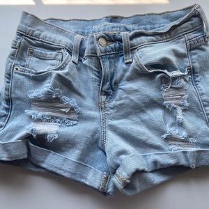 Ripped jean shorts